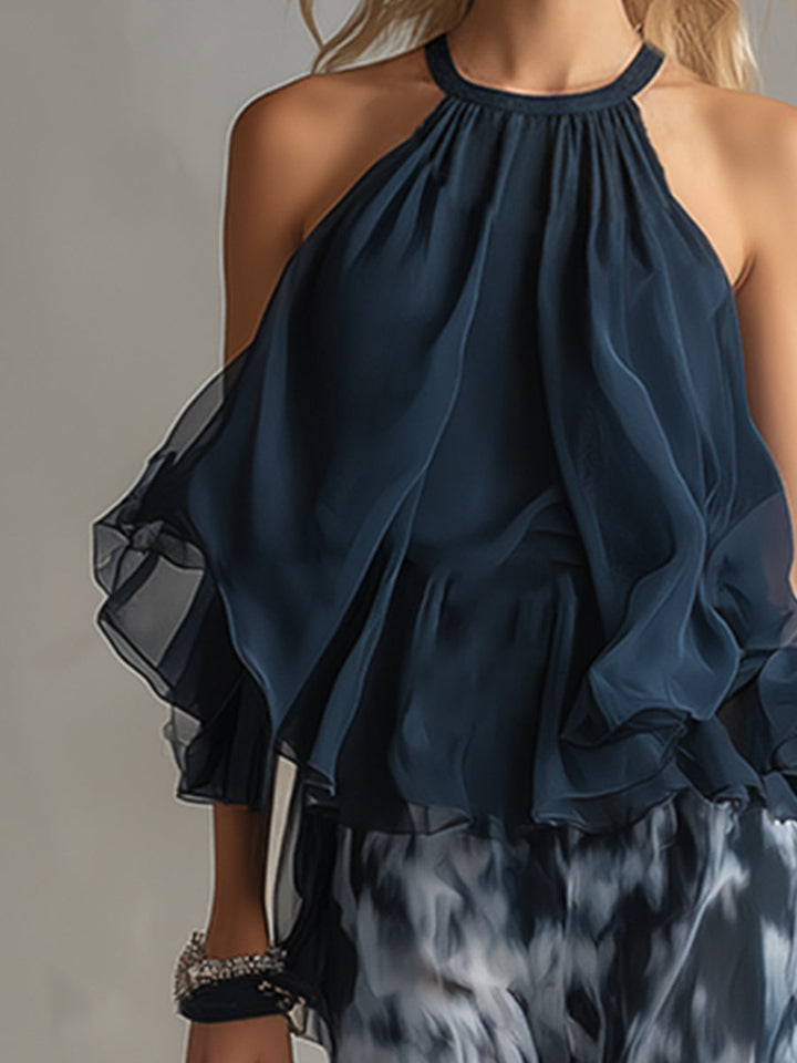 Ludmila | elegante in chiffon con top a collo alto e pantaloni larghi stampati