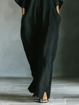 Alessandra | Vestito lungo nero oversize minimalista con maniche a kimono
